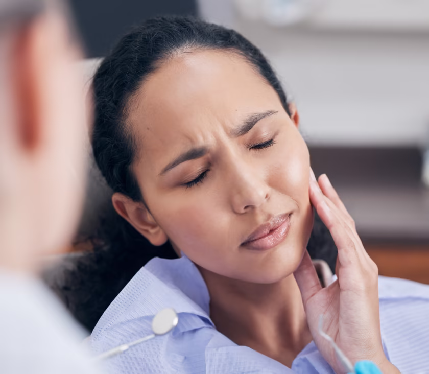 Patient receiving TMJ and TMD therapy for jaw pain relief